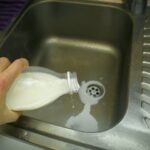 Pouring Milk Down the Drain: Safety & Clog Risks