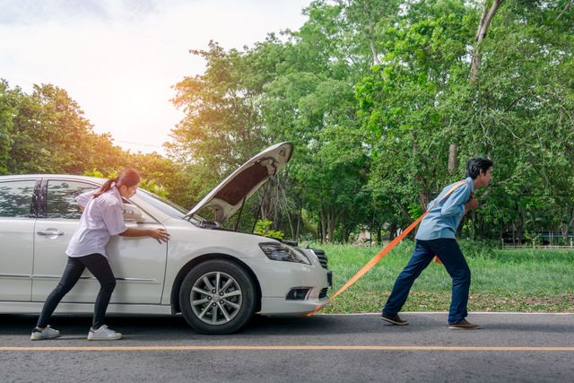 Towing a Car Stuck in Park: Safety & Precautions